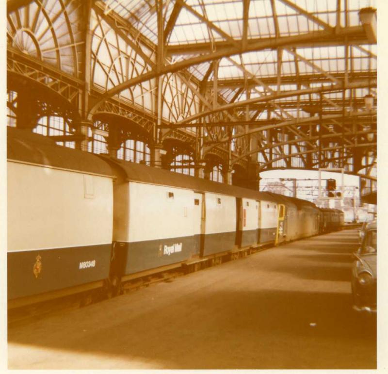 Mail by rail: A reminder of the days when the West Coast Postal used to leave from Glasgow Central.This is in summer years in 1972 with D442 at the head. Photo of Mail by rail