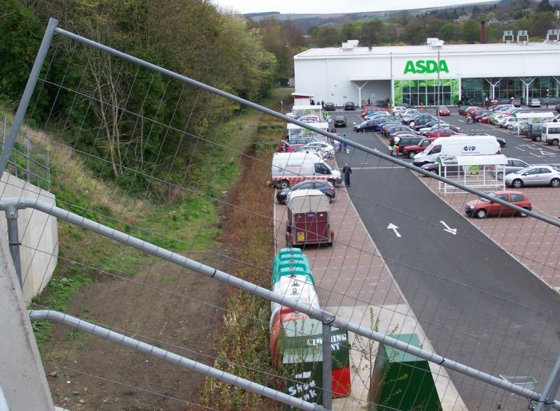 Galashiels original station site: Site of previous Galashiels Station, looking towards Tweedbank - now a carpark for Asda, with the trackbed running close to the store. Photo of Galashiels original station site