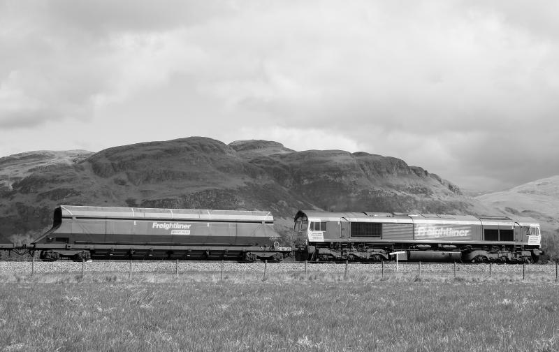 6G05 passes the outskirts of Stirling on Monday 3rd May.: A 66 hauled coal train, bound for Longannet, passes the sunny Ochils. Photo of 6G05 passes the outskirts of Stirling on Monday 3rd May.
