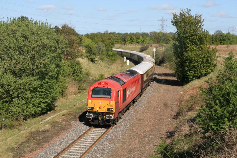 67018 escaping the Binliner: 67018 on 5Z68 Craigentinny to Waverley for 1Z68 16.33 to Birmingham New St. between Brunstane & Niddrie West Jct. on 08/05/2010. Photo of 67018 escaping the Binliner