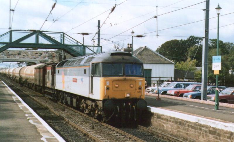 Drem 47361 (with Cockney Sparrow): Class 47, no 47361 heads south through Drem with I believe to be the Leith to Haverton Hill tanks,now a distant memory.
Photo of Drem 47361 (with Cockney Sparrow)