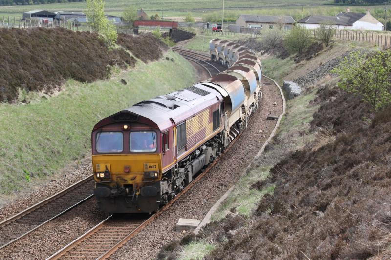 66112: 66112 on 6K working with 10 auto ballast wagons Sunday 16/5/10 12:13 on route to Mossend. Photo of 66112