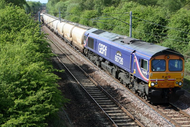 66726: 66726 Seen here approaching Fiddlers gill Sunday 23/5/10 with the diverted empty alcan tanks heading for Blyth. Photo of 66726