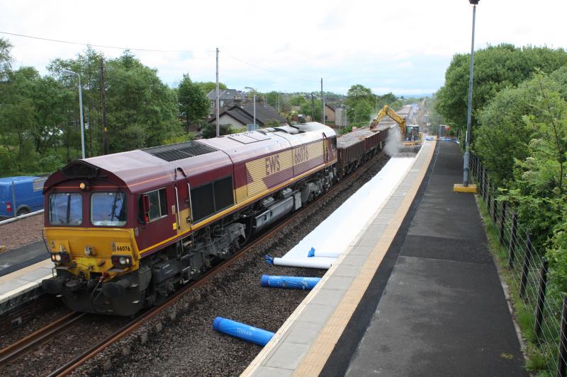 66076: 66076 Sitting with ballast train at Fauldhouse station during track renewal works Sunday 30/5/10
Thanks as always to annoy a mouse for times. Photo of 66076
