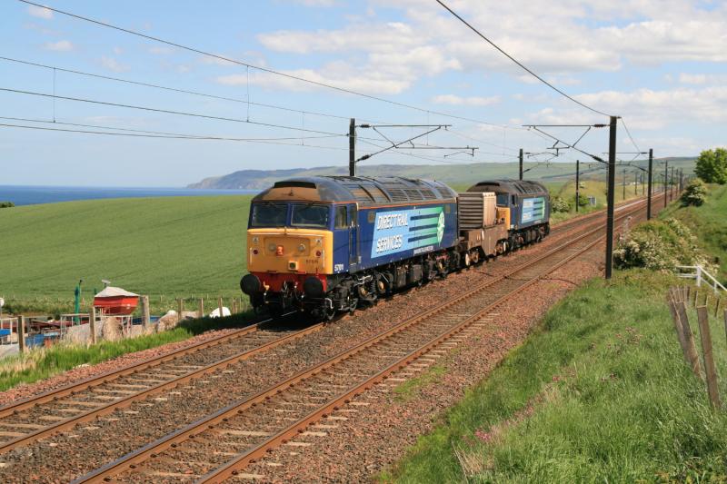 57011 with 57007 on 6M50: 57011 topn tail with 57007 & 1 flask waiting for a northbound class 91 to pass near Torness Power Stn. on 02/06/2010 Photo of 57011 with 57007 on 6M50