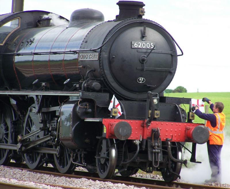 62005 World Cup fever: 62005 sits in Drem loop on 12 June 2010 whilst a member of the support crew decides to live dangerously by ensuring the England flags are clearly visible in Scotland! Photo of 62005 World Cup fever