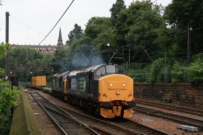 DRS freight in Princes St. Gardens: 37682 + 37194 on 4Z60 07.52 Ditton to Tees Dock passing through Princes St. Gardens in the rain on 24/07/2010. Photo of DRS freight in Princes St. Gardens