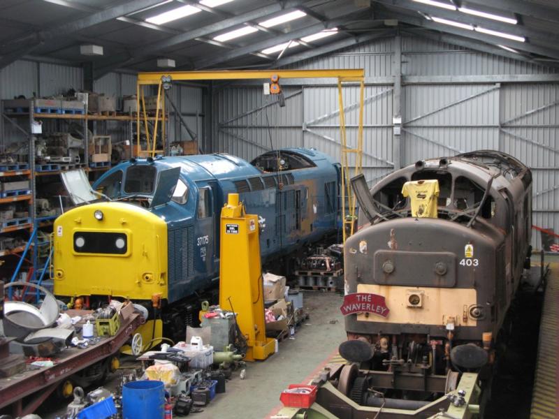 37175 & 37403 under overhaul: 37175 & 37403 sit side by side in the MMPD at Bo'ness on 28/7/10 as they both undergo a heavy overhaul & restoration. Photo of 37175 & 37403 under overhaul