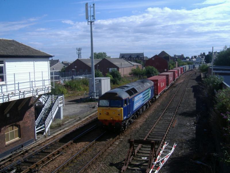 Class 57 at Arbroath: 57 011 on the 4A13 Grangemouth-Aberdeen passing Arbroath. Photo of Class 57 at Arbroath