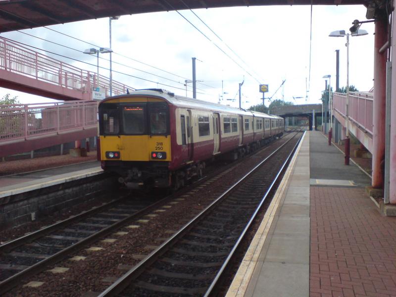 318250 departs Whifflet station: 318250 departs Whifflet station for Coatbridge Central. (19.08.10) Photo of 318250 departs Whifflet station