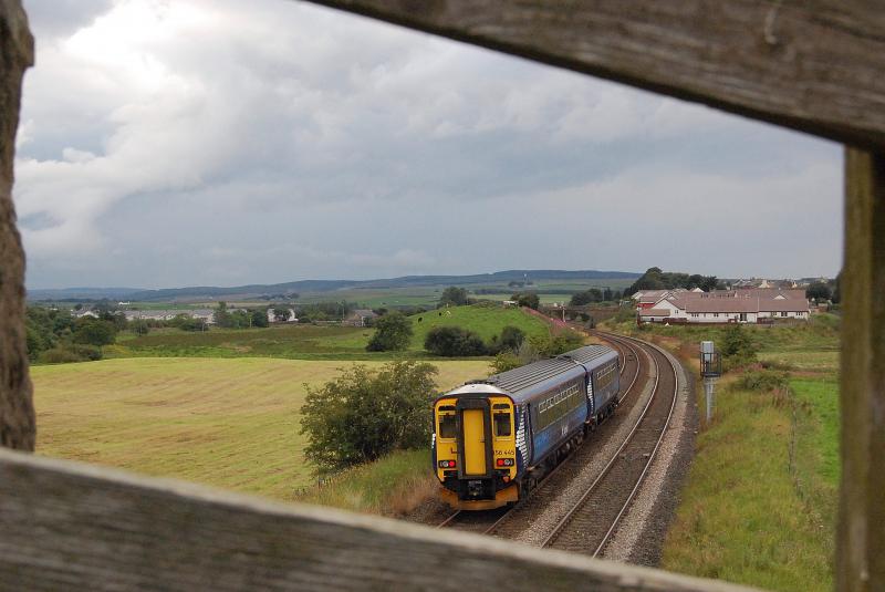 Fence frame: On 9th August 2010 train 1L58 Carlisle to Glasgow approaches New Cumnock Photo of Fence frame
