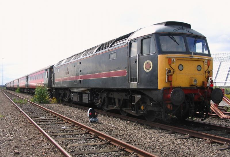 47703.jpg: 47703 lays over in Dundee Yard whilst working the St Andrews Open loco hauled specials in July 2005. Photo of 47703.jpg
