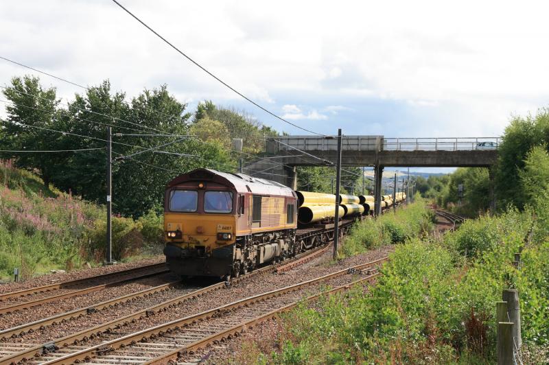 66107 on 6X88: 66107 leaving Millerhill on 6X88 05.38 Hartlepool to Georgemas Jct.on 24/08/2010. The sun came out in time after several attempts. Photo of 66107 on 6X88