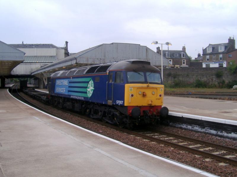 Class 57 at Arbroath: 57 007 passing thro' Arbroath station with the 4A13 Grangemouth-Aberdeen intermodal on 26/08/2010. Photo of Class 57 at Arbroath