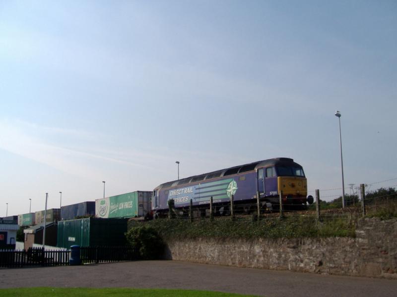Class 57 at Arbroath: Class 57 57 011 on the 4A13 Grangemouth-Aberdeen passing Kerr's Miniature railway at Arbroath on 03/09/2010. Photo of Class 57 at Arbroath