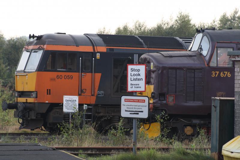 Loadhaul in Fife.: 60059 is pictured alongside 37676 at Thornton Depot on 8th September 2010.The 60 was being used to shunt scrap wagons for cutting, the 37 had dropped K4 The Great Marquess off a few days previously. Photo of Loadhaul in Fife.