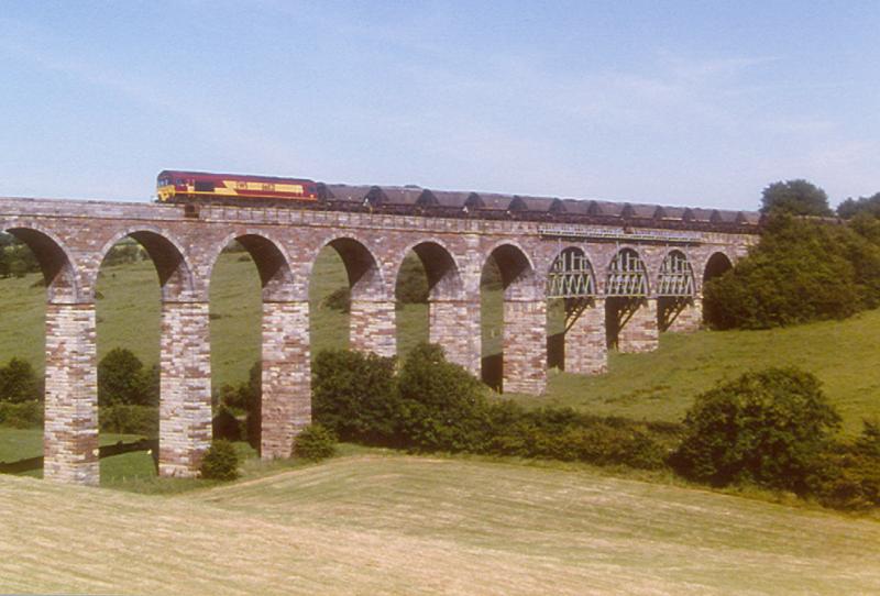 Dalrymple Viaduct: An unidentified class 66 (possibly 66113) crossing Dalrymple viaduct on the Waterside branch with coal from Chalmerston, bound for Falkland Yard. Summer 2004 Photo of Dalrymple Viaduct