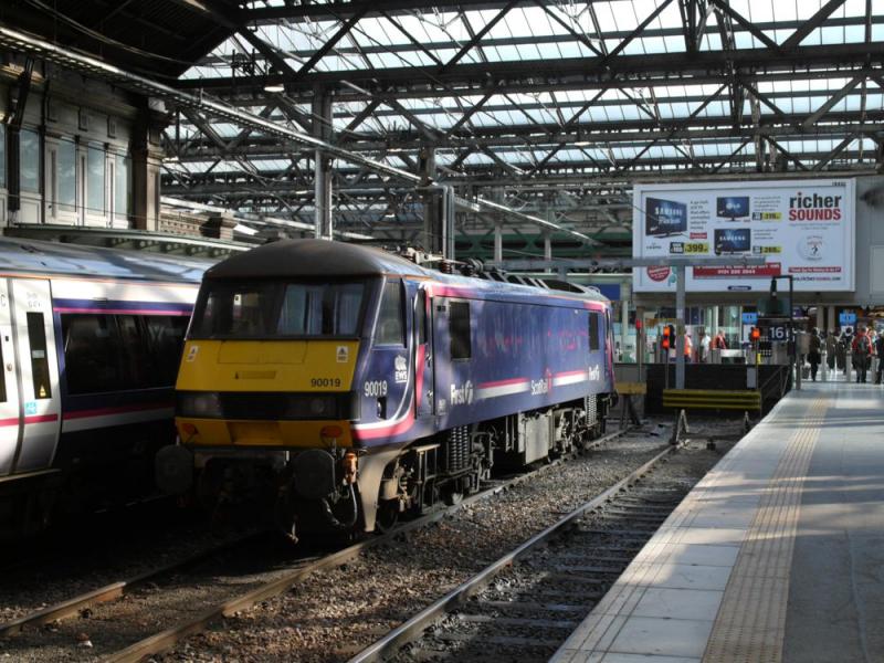 90019 in Edinburgh Waverley middle siding: With engineering work blocking the east end of Waverley the sleeper loco was stabled in the newly wired west end instead.
11 Sept 2010 Photo of 90019 in Edinburgh Waverley middle siding