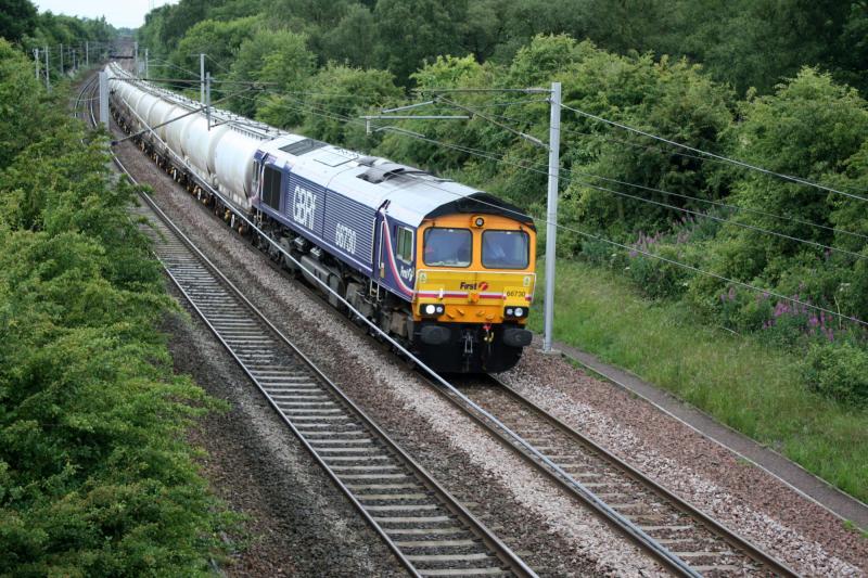 GBRF 66730 tanks: 66730 passing fiddlers gill 18/7/10 with empty alcan tanks. Photo of GBRF 66730 tanks