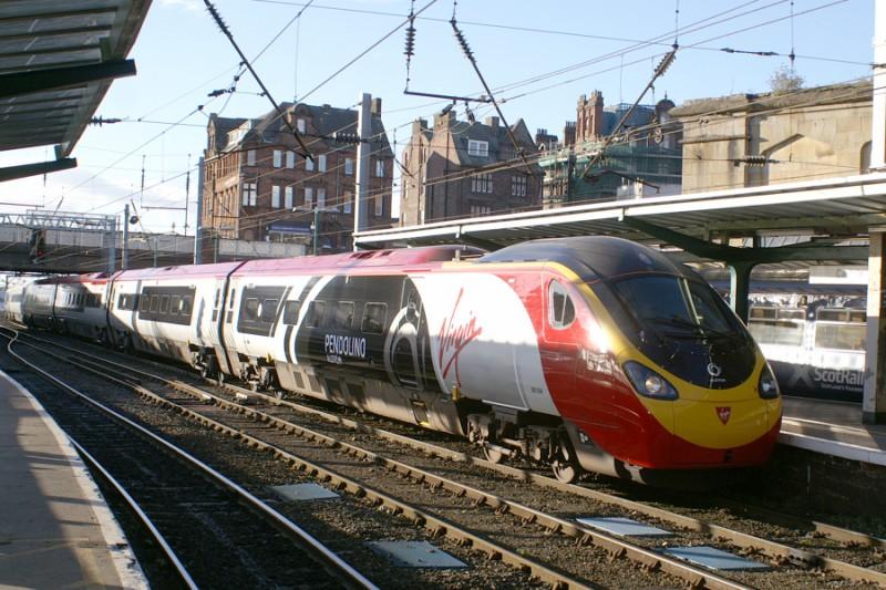 390004: Just a few days after naming & part re-branding 390004 enters Carlisle with the 1M17 16.40 Glasgow to Euston on 16th September Photo of 390004
