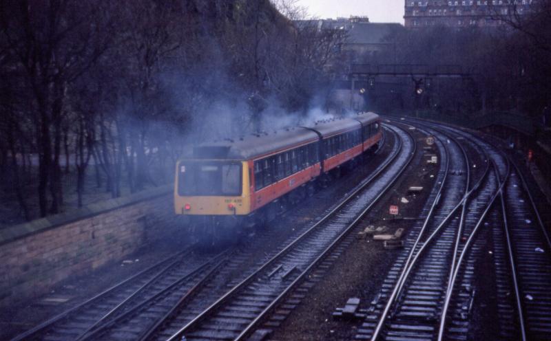 REEKIE DMU: 107 435 heads away from the camera in Princes Street gardens. Photo of REEKIE DMU