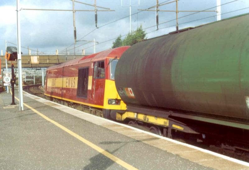 60047 at Motherwell: Heading for Grangemouth with the empty Dalston tanks in October 1996. Photo of 60047 at Motherwell