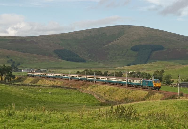 Photo of 87002 hurtles south at Crawford