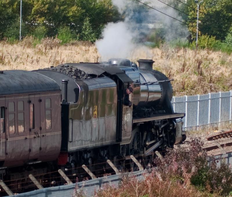 Crew member Chilling out: 5Z19 Carnforth-Fort William Loco switch. Thu 30th Sept 2010
44871 to replace 45231 coming back Fort William-Carnforth 5Z20
1 of the Crew members (Top half at least) chills out at a signal check Photo of Crew member Chilling out