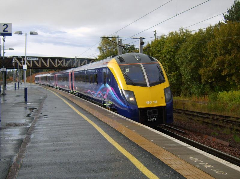 5Z80 01/10/10: 180111 slows for the Edinburgh line at Carstairs today at 16-20, en route to Hull from Kilmarnock. Photo of 5Z80 01/10/10