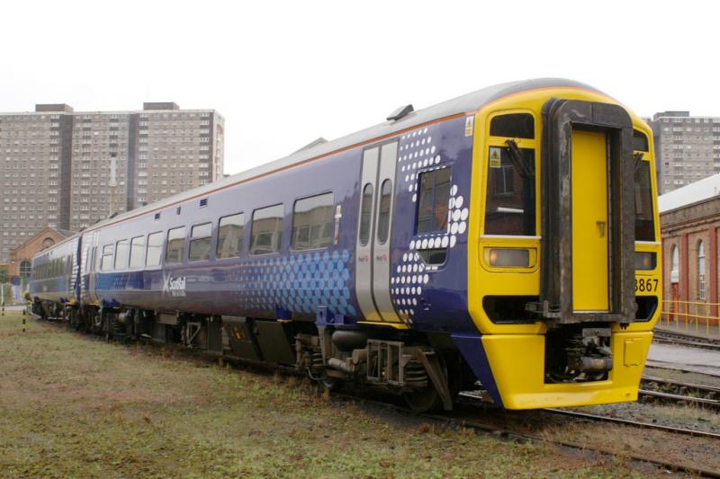 158867: 158867 Stands in the yard Ex Works prior to departure on a wet sunday morning 3rd October
Photo taken with kind permission of Railcare/FirstScotrail
Photo of 158867