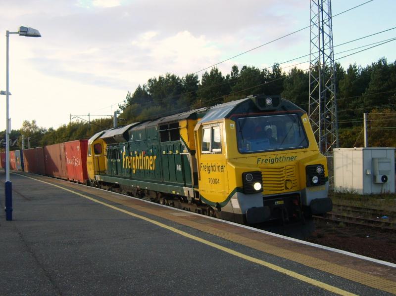 4M80 041010: 70004 heads south through Carstairs on only the second classs 70 hauled container service from Scotland. Photo of 4M80 041010