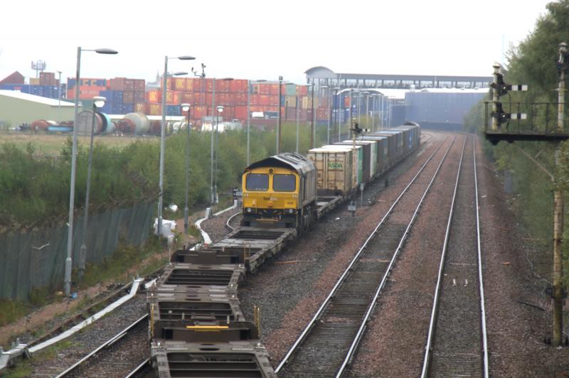 4A13 shunting 4M?? at Grangemouth: 66417 on 4A13 shunting 66434 with 9 twins for 4M?? from one side of Grangemouth Terminal into the main loading siding on 08/10/2010. Photo of 4A13 shunting 4M?? at Grangemouth