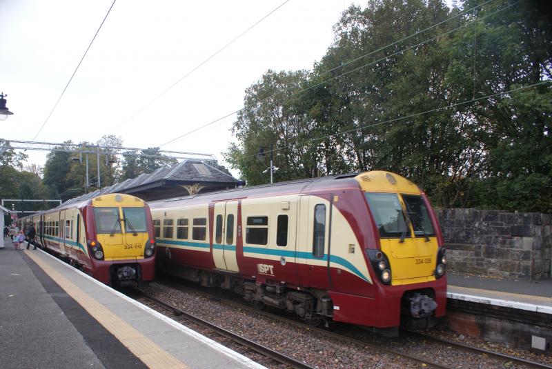 Juniper Twins: Terminus station of Milngavie has a host of EMU's - 334's , (as seen here) - 320's & 318's. You can also get a nice cup of coffee from the station mobile cafe!! Photo of Juniper Twins