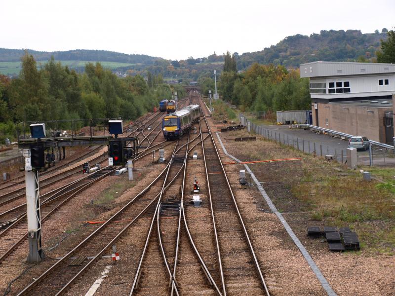 Passing Trains: 67007 can be seen running around the RHTT in Perth Up Loops as a class 170 on a Glasgow to Aberdeen service crosses the junction into the Dundee Platform.
Photo of Passing Trains