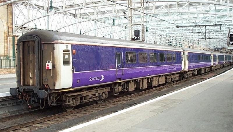 Photo of Sleeper seated coach 9801 at Glasgow C (June 2001)