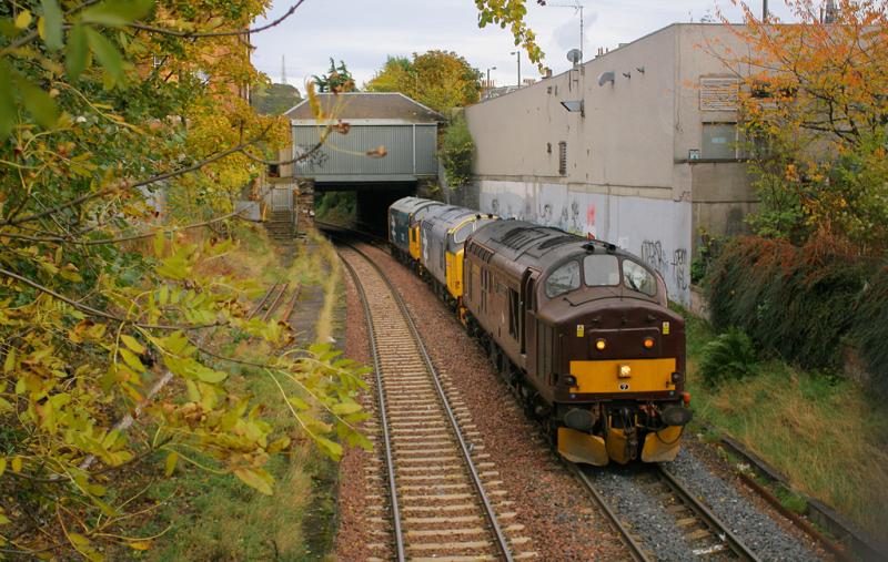 Autumnal Tractors: With the autumn colours starting to come through on the surrounding leaves, 37676 drags 37906 & 37025 through the remains of Morningside Road station on 22.10.10, while working as the 0Z38 York NRM - Bo'Ness loco convoy. Photo of Autumnal Tractors