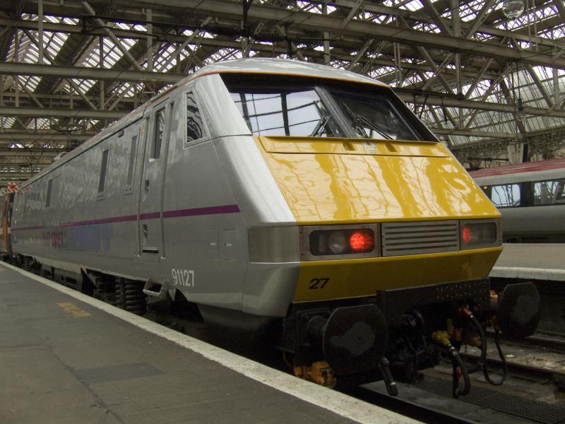 Silver 91: East Coast Railways 91127 at Platform 2 at Glasgow Central in it's new silver coat Photo of Silver 91