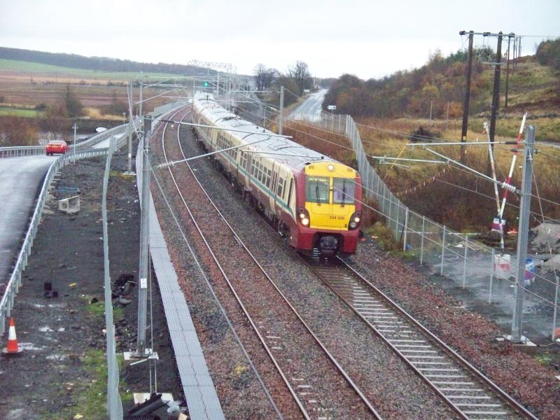 2x 334s on A-B on 06/11: Minutes after 55022 went the other way, 334026 leads 334xxx on a driver training run Photo of 2x 334s on A-B on 06/11