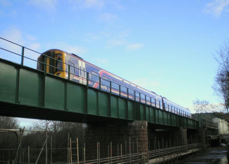 Beauly Viaduct: Beauly Viaduct goes Green. 10.38 Inverness to Wick approaches the station : 10/11/2010 Photo of Beauly Viaduct