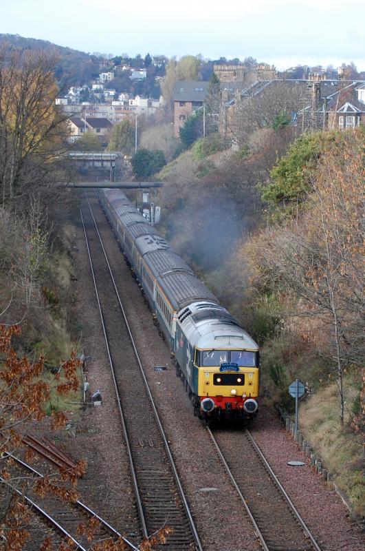 47580 climbs to Craiglockhart: 47580 resplendant in BR Blue with a matching rake of coaches climb up from Gorgie Jn to Craiglockhart Jn on Saturday 13th November 2010 at 1252. 5Z47 1242 Edinburgh Waverley - Craigentinny. Photo of 47580 climbs to Craiglockhart