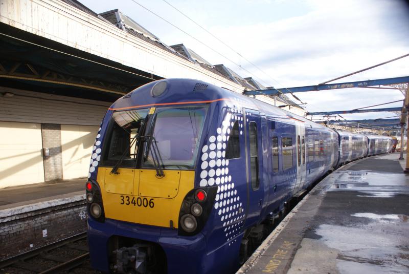 Juniper In New Clothes: One of the first full 334 3-car sets to be re-liveried into Scotrail decals (or spotrail if you prefer!). 334006 sits at the stops at Gourock-Sunday 11th November 2010. Photo of Juniper In New Clothes