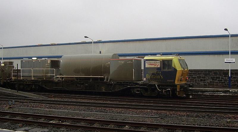 RHTT MPV units DR 98957 T&T DR98907: RHTT with Network Rail MPV units DR98957 T&T with DR98907 arrive at Kilmarnock 0n 5th November 2010 Prior to entering NR yards Photo of RHTT MPV units DR 98957 T&T DR98907