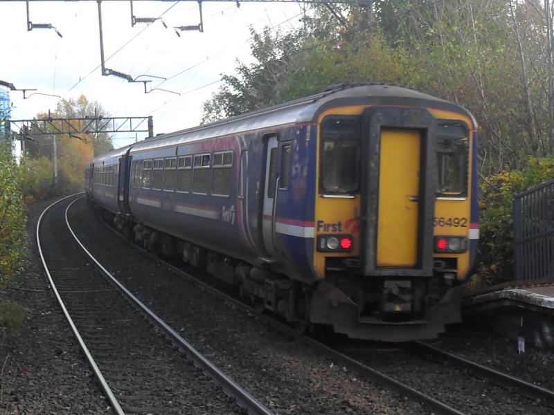 156492 by Westerton: 156492 and two classmates pass Westerton bound for Glasgow Queen Street. Photo of 156492 by Westerton