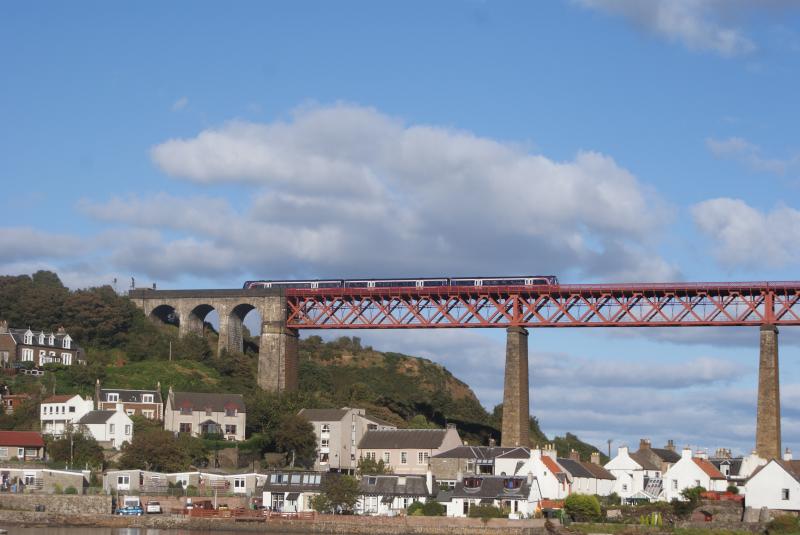 Above North Queensferry: Class 170 Turbostar takes it's time as it enters the Forth Bridge southbound , with the safety siren sounding less than a mimute before. Photo of Above North Queensferry