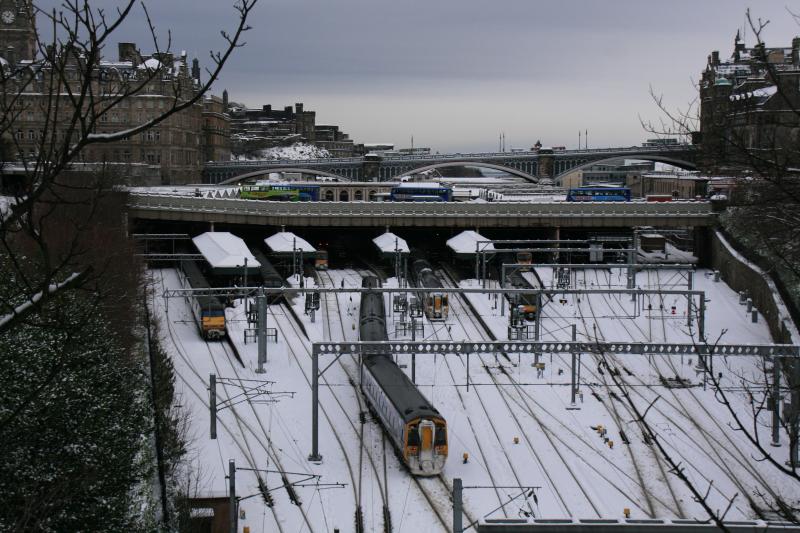 Waverley from the Mound: 158731 at the rear of an unidentified service arriving in Platform 16 Waverley on 03/12/2010 classes 91,170,185 & 322 stabled Photo of Waverley from the Mound