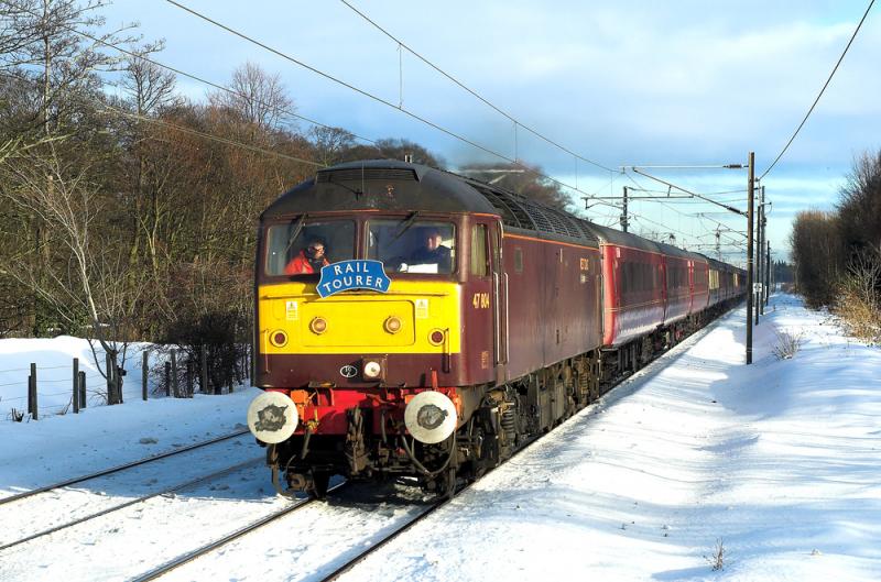 Edinburgh Christmas Special: 47804 leads (and 47826 tails) the Stevenage - Edinburgh special as it approaches Longniddry in snow and sun. 4 December 2010 Photo of Edinburgh Christmas Special