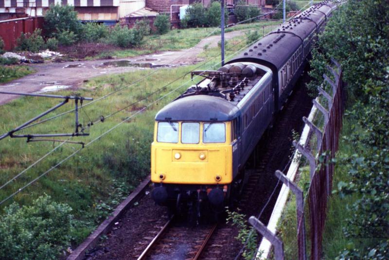 Garden Festival Special: 85002 heading for Exhibition Centre in May 1988 with the ECS to form a special for the Whitley Bay Horticultural Society who had been at the Garden Festival. Photo of Garden Festival Special