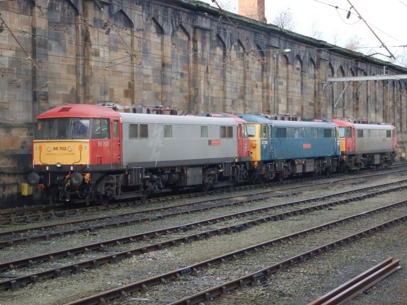 Frozen electrics: 86702, 87002 and 86701 sit in Carlisle, bet these locos are all frozen after the very cold conditions! Photo of Frozen electrics