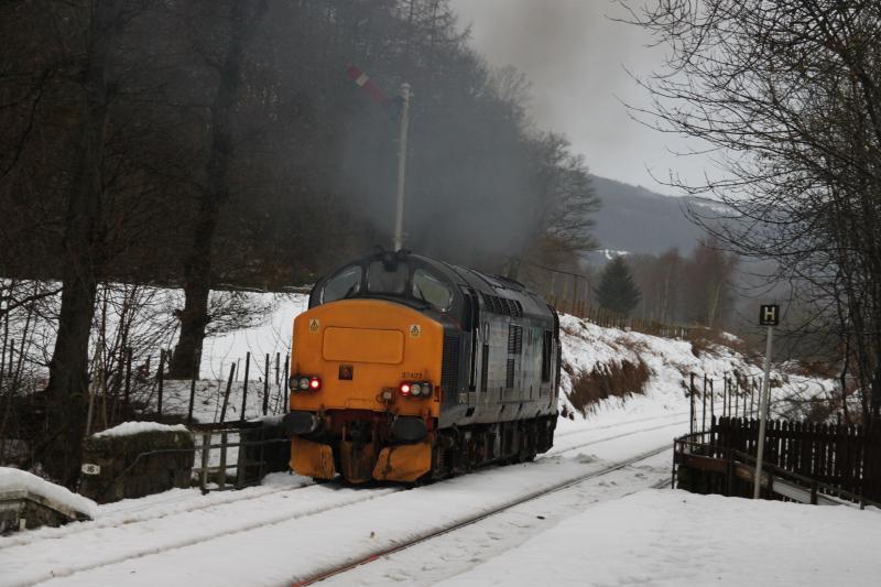 37423 Clagging departure: Signal up and off 37423 ' Spirit of the Lakes' departs Dunkeld & Birnam Station on 4/01/11 Photo of 37423 Clagging departure
