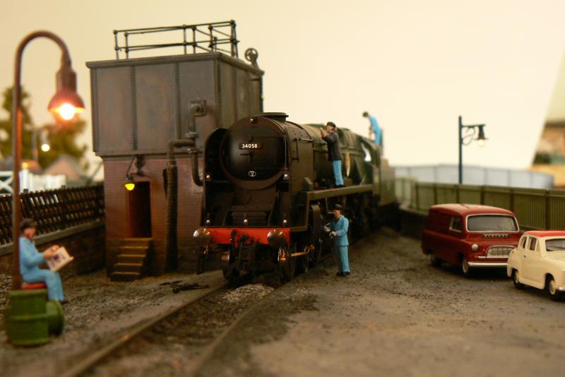 Getting ready for the road: . . .a big Southern machine being prepared for it's next turn of duty (although someone would rather read his paper!!) Photo of Getting ready for the road